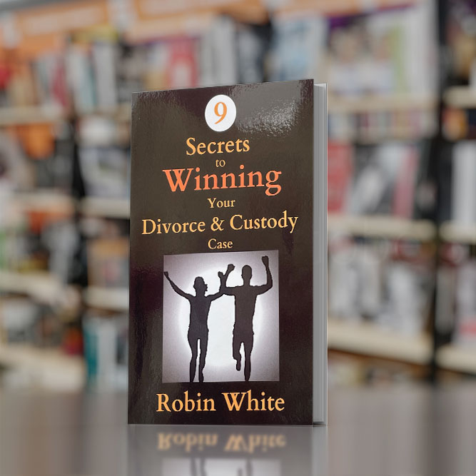 photo of book on table in with shelves of books in background